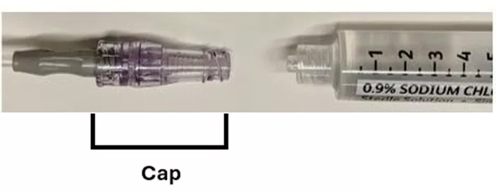 The cap on the end of a CVAD stays on. Syringes attach directly to the cap.