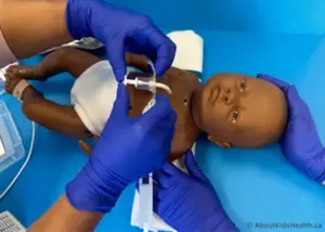 two person tracheostomy tube change on teaching doll